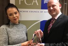 Salts of the Earth a winner Ash Humphreys, manager of Pakenham Salts of the Earth with owner Andrew Davey at the FCA awards night.