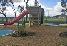 A playground with a first class racetrack for kids